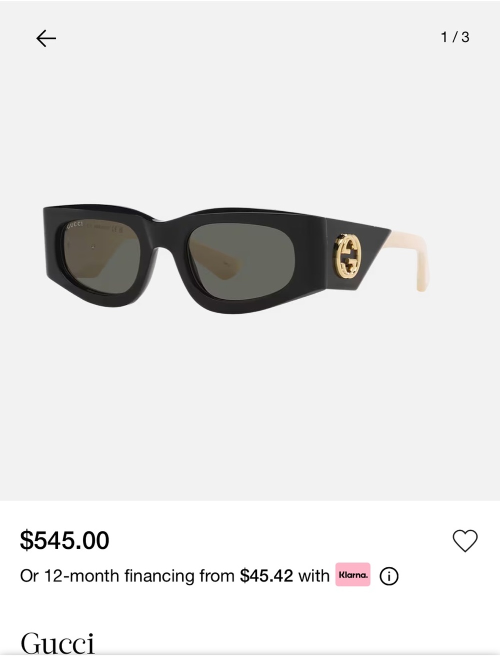 Gucci Black Cat-Eye Sunglasses with Cream Temples and Gold Logo